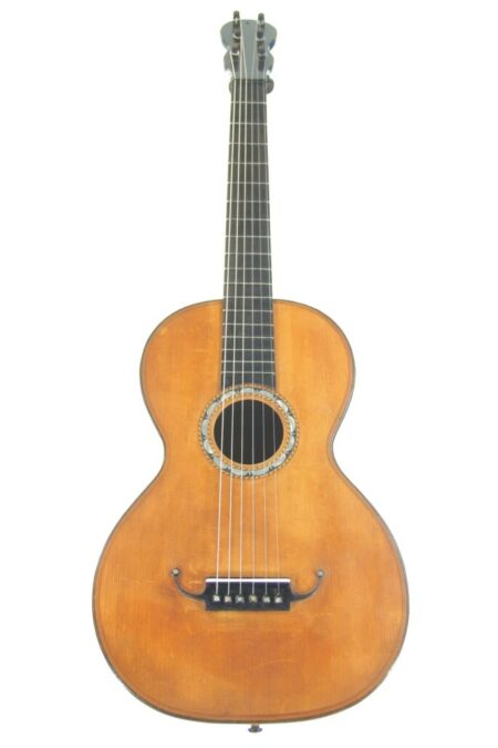 The French romantic guitar ~1860 features a natural wood finish, six strings, a round sound hole with decorative inlay, and a dark fingerboard, reflecting 19th-century elegance against a white background.
