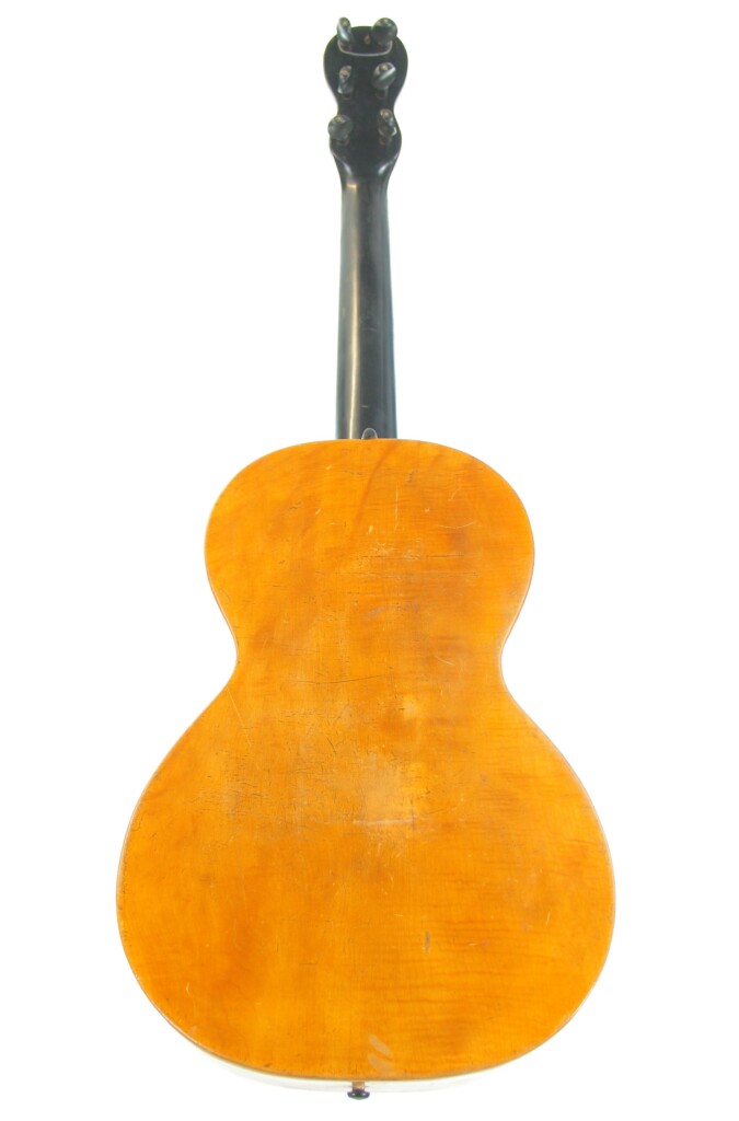 Ein Hölzernes Saiteninstrument, Die Französische Romantikgitarre ~1860, Ist Von Hinten Abgebildet Und Hat Einen Hellbraunen Korpus Und Einen Dunklen Hals, Auf Dem Sich Ein Geschnitzter Tierkopf Befindet.