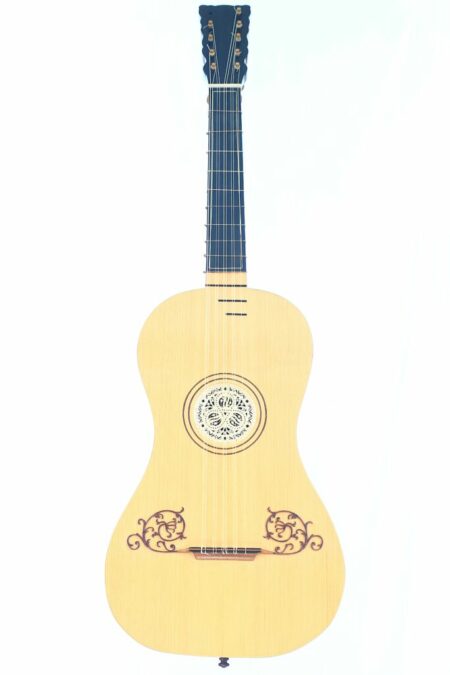 The John Preston ~1780 baroque guitar features a light wood body, intricate rosette, decorative carvings by the bridge, a straight neck, and dark tuning pegs.