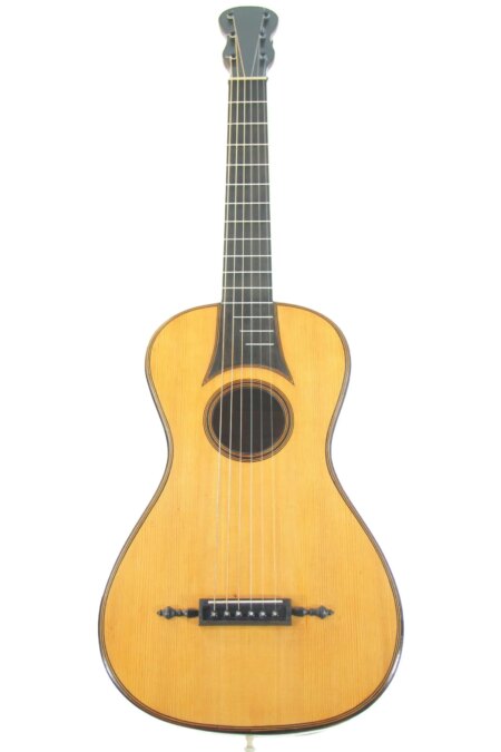 The Etienne Perrin ~1810 Romantic Guitar features a light wooden body, black pickguard, and simple design, shown against a white background.