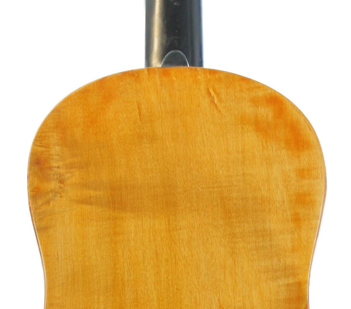 Close-Up Of The Back Of The Karl Frey Baroque Guitar, Highlighting Its Smooth, Light Wood Finish With Visible Grain Patterns And Part Of The Neck At The Top.
