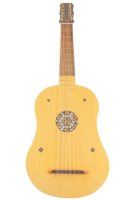 The Luis Milan Vihuela 1535/36 is a vintage stringed instrument with a light wooden body, eight double courses, a decorative circular sound hole, and simple geometric inlays.