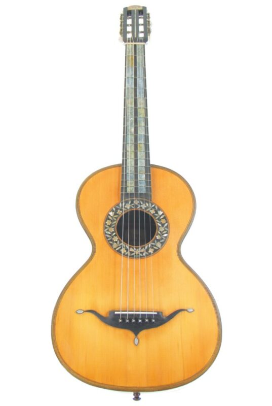 The Leon Victor Mougenot 1900 Romantic Guitar features a light wood body, ornate sound hole rosette, and decorative fretboard inlays, photographed against a white background.
