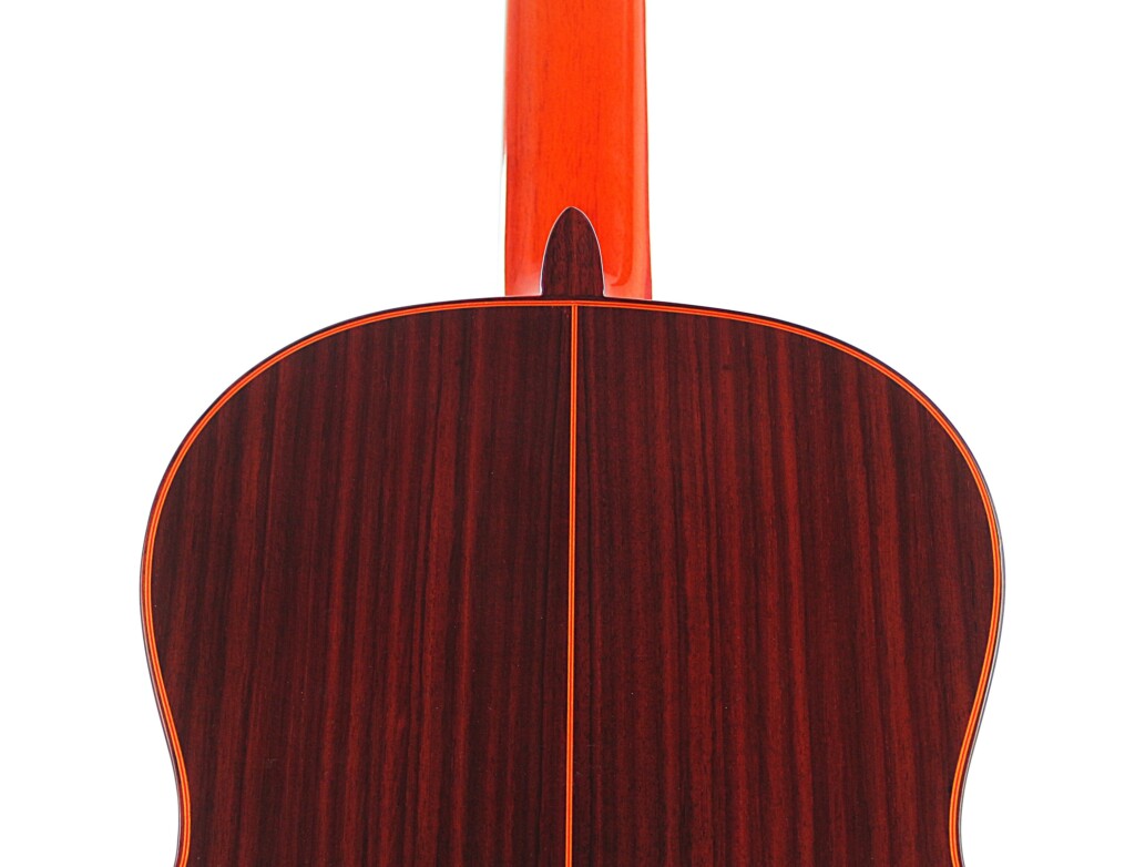 Das Bild Zeigt Die Rückseite Der Hermanos Conde 1999 Paco De Lucia Spezial Flamenco Gitarre Mit Dunklem Holzfinish, Sichtbarer Mittelnaht Und Rötlich-Orangefarbenem Hals.