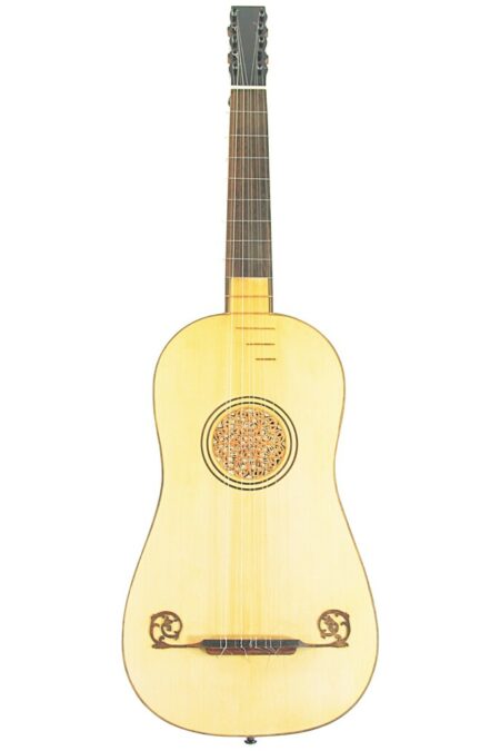 The Alexandre Voboam 1676 baroque guitar features a light wooden body, decorative rosette sound hole, and intricate carvings near the bridge, shown against a white background.