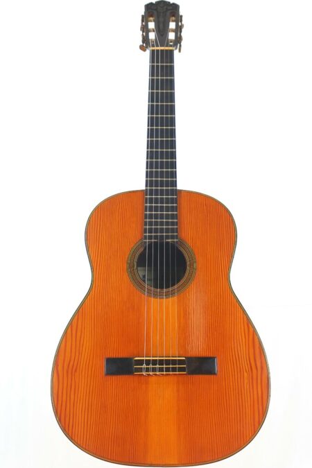 The Francisco Candreva 1948 Classical Guitar features a wooden body, dark fretboard, and six strings, showcased against a white background.