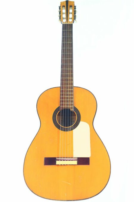 A Miguel Rodriguez 1960s Flamenco Guitar with a natural wood finish, six strings, round sound hole, and white pickguard, photographed against a plain white background.