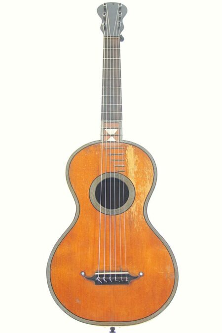 A Joseph Garaboeuf - Lacombe 1850 Romantic Guitar with six strings, a round sound hole, and a simple bridge is shown on a white background, featuring a brown finish and subtle wear on the body.