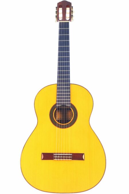 A Conde Hermanos Felipe V N2 2010 Flamenco Guitar with a natural wood finish, six strings, dark fingerboard, and round sound hole is shown against a plain white background.