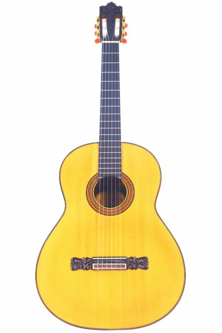 The José Ruiz Pedregosa 2020 Classical Guitar features a light wooden body, dark fretboard, decorative rosette, and ornate headstock and bridge, photographed on a white background.