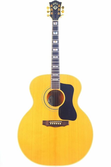 A full view of a Guild F-50 1980 Acoustic Guitar with a natural wood finish, dark pickguard, and pearl fretboard inlays, photographed against a white background.