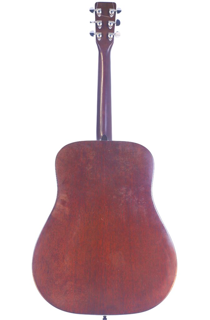 Back View Of A Martin D-18 1967 Acoustic Guitar With A Dark Wood Finish, Displaying The Neck, Tuning Pegs, And Full Rear Body Against A White Background.