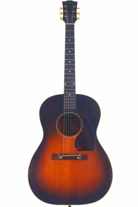 The Gibson LG-2 1951 Acoustic Guitar features a vintage sunburst finish, rounded body, dark edges fading to a light center, six strings, pickguard, and dot inlays on the fretboard.