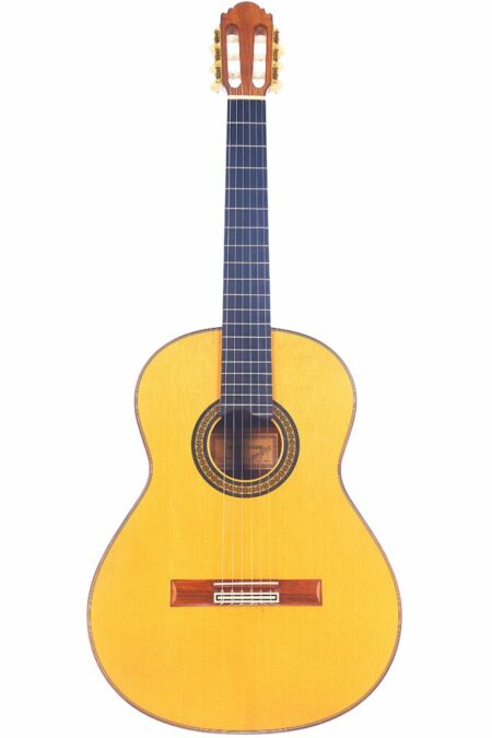 A Casimiro Lozano 2013 Classical Guitar featuring a light wood body, dark fretboard, and six strings is shown against a white background.