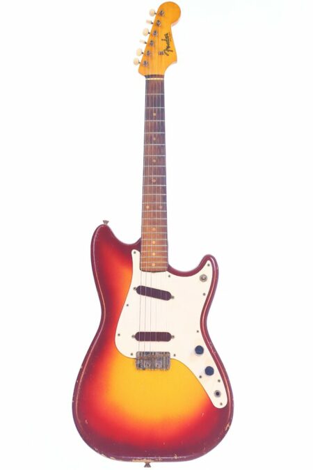 The Fender Dousonic 1962 Electric Guitar features a sunburst finish, two white single-coil pickups, a white pickguard, and a maple neck, and is shown standing upright against a white background.