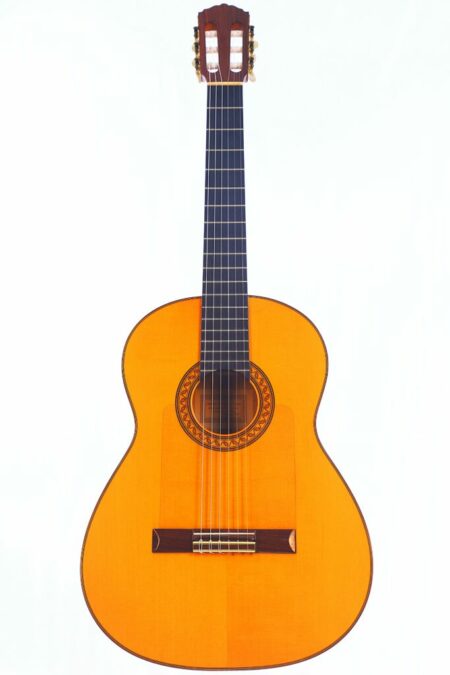 The Conde Hermanos - Sobrinos de Domingo Esteso 1996 Flamenco Guitar features a light wood body, dark fretboard, and detailed rosette around the sound hole, displayed against a plain white background.