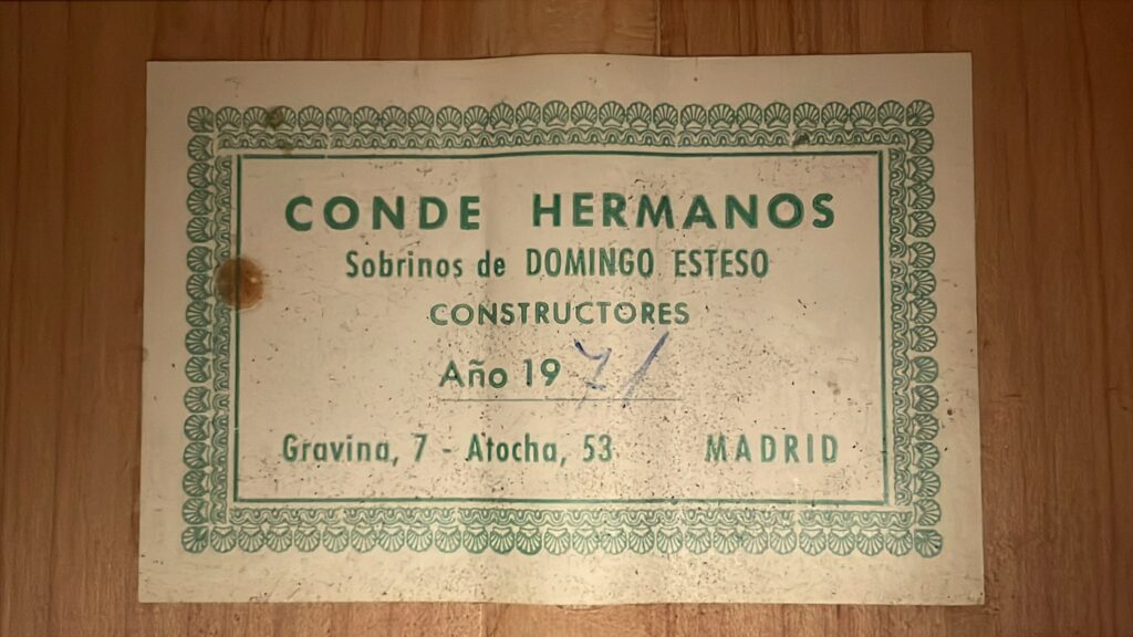 A Vintage Label On The Conde Hermanos 1971 Flamenco Guitar Features A Decorative Green Border And Reads: Conde Hermanos Sobrinos De Domingo Esteso, Constructores, Año 19 /, Gravina, 7 - Atocha, 53, Madrid.
