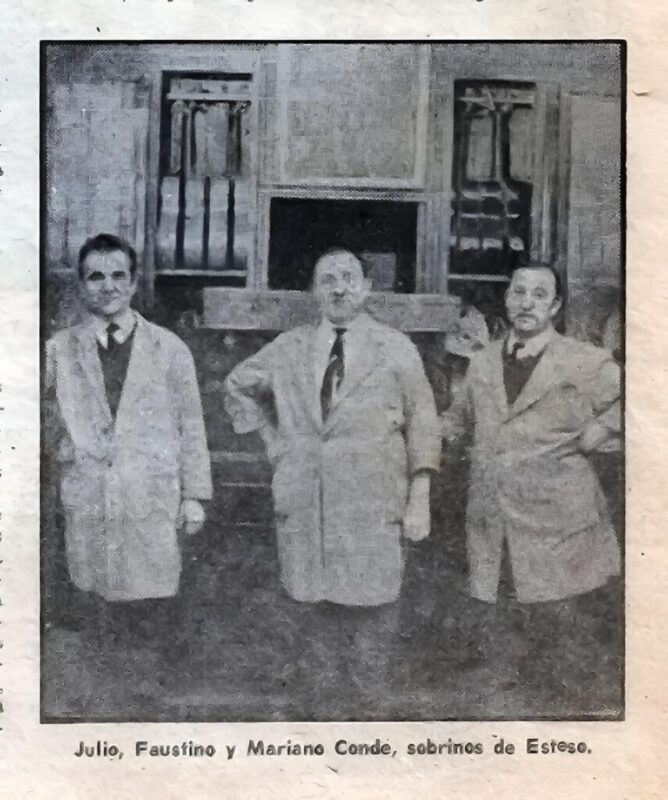 Three men in lab coats stand indoors, posing for a photo. The background shows large pipes and equipment. The caption below identifies them as Julio, Faustino, and Mariano Conde, nephews of Esteso.