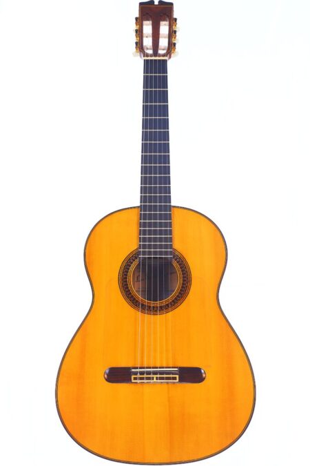 The Luis Sanchez 2011 Negra Flamenco Guitar features a natural wood finish, dark fretboard, and decorative rosette around the sound hole, photographed against a white background.