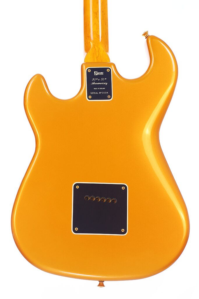 The Burns Legend 1994 Electric Guitar In Bright Orange Is Shown From The Back, Featuring A Central Rectangular Black Plate With Screws And A Smaller Metal Neck Joint Plate, All Set Against A White Background.