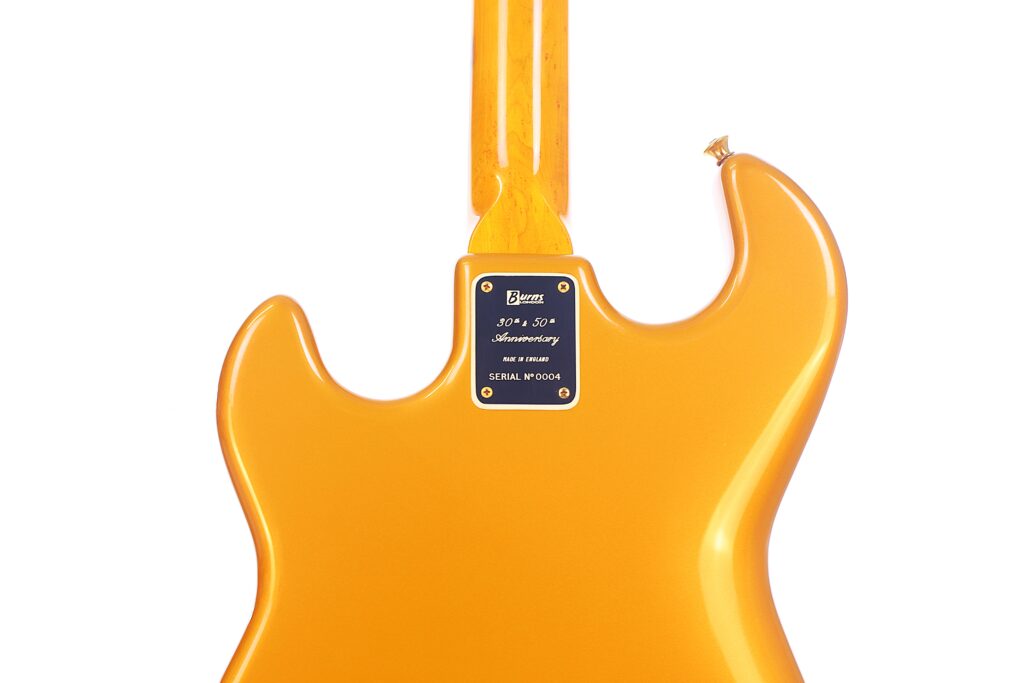 The Back Of A Yellow Burns Legend 1994 Electric Guitar, Focusing On The Neck Joint Plate With Model Details And Serial Number. The Guitar Features A Glossy Finish And Smooth Contours.