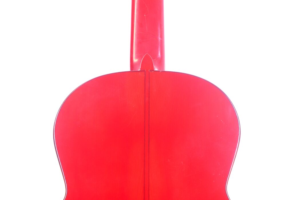 Das Bild Zeigt Die Rückansicht Einer Manuel Guillena 2017 Blanca Flamenco Gitarre, Wobei Der Korpus Und Der Untere Hals Vor Einem Weißen Hintergrund Hervorgehoben Werden.