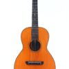 Eine Washburn Tonk Brothers 1935 Akustik-Gitarre mit Holzkorpus, sechs Saiten und dunklem Griffbrett, die vor einem schlichten weißen Hintergrund präsentiert wird. Eine Washburn Tonk Brothers 1935 Akustik-Gitarre mit Holzkorpus, sechs Saiten und dunklem Griffbrett, die vor einem schlichten weißen Hintergrund präsentiert wird.