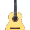 Eine Antonio Rodriguez Galadi 2017 Negra Flamenco Gitarre mit hellem Holzkorpus, dunklem Griffbrett, sechs Saiten und rundem Schallloch, fotografiert vor weißem Hintergrund. Eine Antonio Rodriguez Galadi 2017 Negra Flamenco Gitarre mit hellem Holzkorpus, dunklem Griffbrett, sechs Saiten und rundem Schallloch, fotografiert vor weißem Hintergrund.
