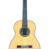 Die Daniele Chiesa 2021 Klassische Gitarre ist eine klassische Akustikgitarre mit einem hellen Holzkorpus, einem dunklen Griffbrett, sechs Saiten und einer Rosette um das Schallloch, fotografiert auf weißem Hintergrund. Die Daniele Chiesa 2021 Klassische Gitarre ist eine klassische Akustikgitarre mit einem hellen Holzkorpus, einem dunklen Griffbrett, sechs Saiten und einer Rosette um das Schallloch, fotografiert auf weißem Hintergrund.