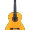 Die Manuel Contreras Double Top 1985 Klassische Gitarre, eine klassische Akustikgitarre mit hellem Holzkorpus und dunklem Griffbrett, sechs Saiten, wird vor einem einfachen weißen Hintergrund gezeigt. Die Manuel Contreras Double Top 1985 Klassische Gitarre, eine klassische Akustikgitarre mit hellem Holzkorpus und dunklem Griffbrett, sechs Saiten, wird vor einem einfachen weißen Hintergrund gezeigt.
