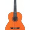 Die Juan Miguel Gonzalez 2006 Klassische Gitarre ist eine klassische Akustikgitarre mit einem Holzkorpus, einem dunklen Griffbrett und einer kunstvollen Rosette um das Schallloch, die vor einem weißen Hintergrund abgebildet ist. Die Juan Miguel Gonzalez 2006 Klassische Gitarre ist eine klassische Akustikgitarre mit einem Holzkorpus, einem dunklen Griffbrett und einer kunstvollen Rosette um das Schallloch, die vor einem weißen Hintergrund abgebildet ist.