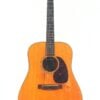 Die Martin D-21 1965 Akustik Gitarre hat ein natürliches Holzfinish, ein dunkles Griffbrett und ein Schildpatt-Schlagbrett, das vor einem schlichten weißen Hintergrund zur Geltung kommt. Die Martin D-21 1965 Akustik Gitarre hat ein natürliches Holzfinish, ein dunkles Griffbrett und ein Schildpatt-Schlagbrett, das vor einem schlichten weißen Hintergrund zur Geltung kommt.