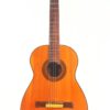 Die Ricardo Sanchis Nacher 1940 Flamencogitarre hat einen Holzkorpus, sechs Saiten, ein dunkelbraunes Griffbrett und ein rundes Schallloch, fotografiert auf einem schlichten weißen Hintergrund. Die Ricardo Sanchis Nacher 1940 Flamencogitarre hat einen Holzkorpus, sechs Saiten, ein dunkelbraunes Griffbrett und ein rundes Schallloch, fotografiert auf einem schlichten weißen Hintergrund.