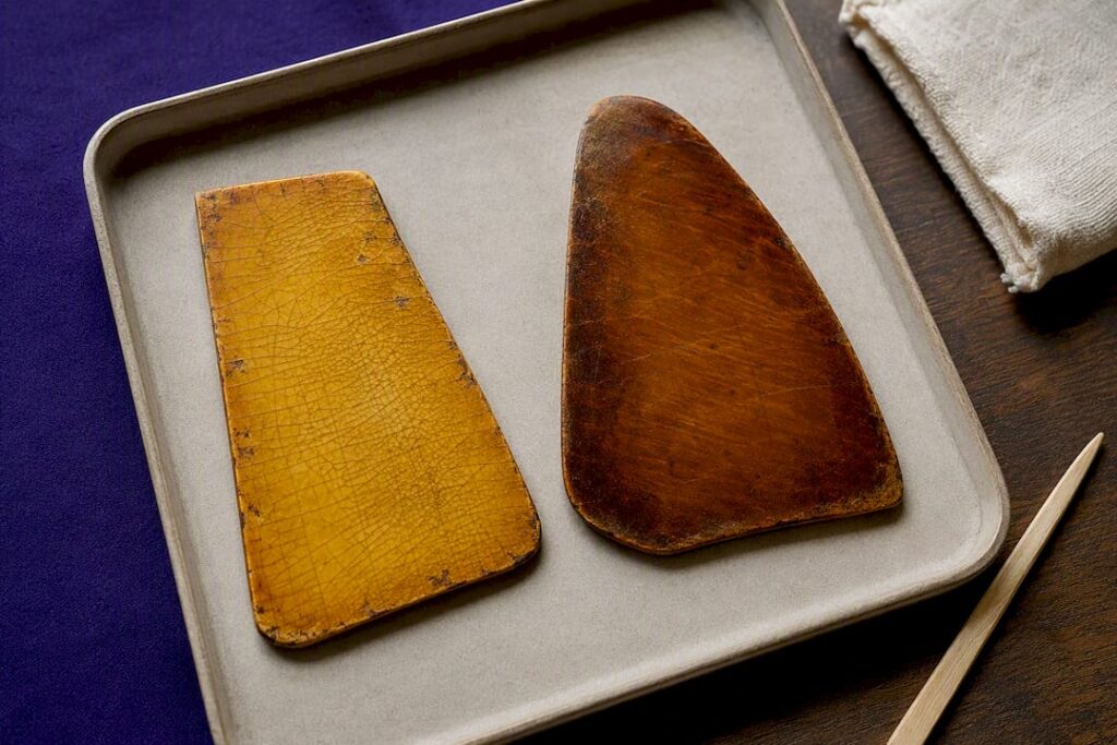 Contrasting aged guitar finish surfaces