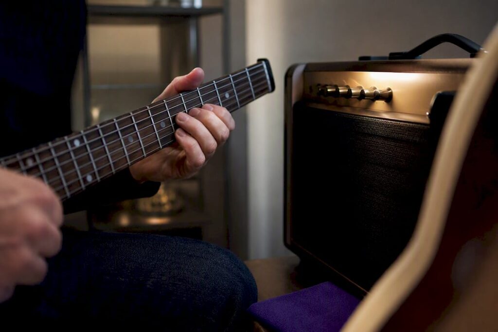 Musician maintaining consistent guitar comparison setup