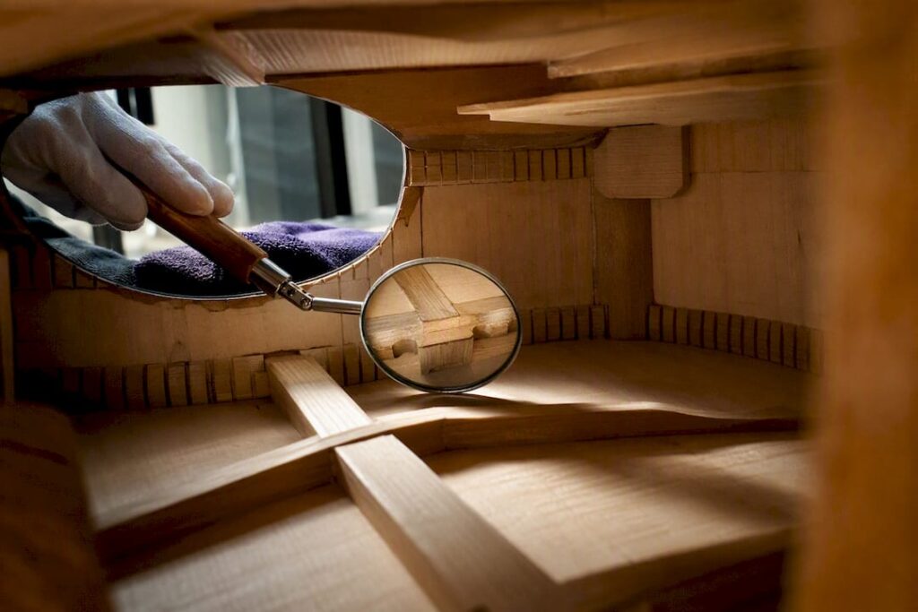 Inspecting guitar bracing and interior wood