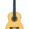 Eine Lester DeVoe 2020 Negra Flamenco Gitarre mit hellem Korpus, dunklem Griffbrett und sechs Saiten, fotografiert vor einem schlichten weißen Hintergrund. Eine Lester DeVoe 2020 Negra Flamenco Gitarre mit hellem Korpus, dunklem Griffbrett und sechs Saiten, fotografiert vor einem schlichten weißen Hintergrund.